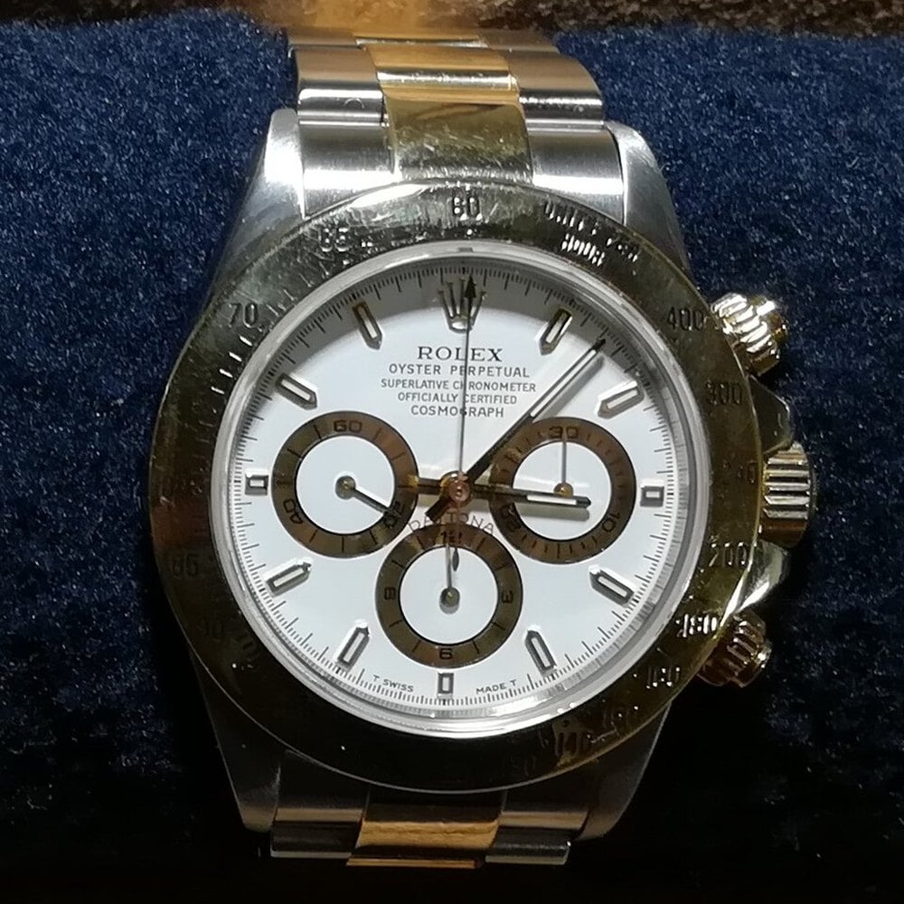 Rolex Cosmograph Daytona with a white dial and three sub-registers