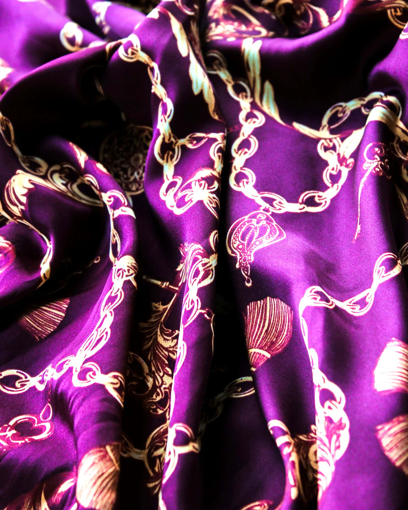 Violet silk scarf printed with ivory chain and shell motifs